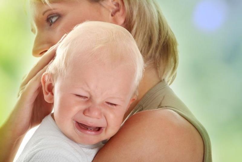 A mother calming a child