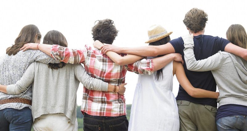 Big family hugging each other