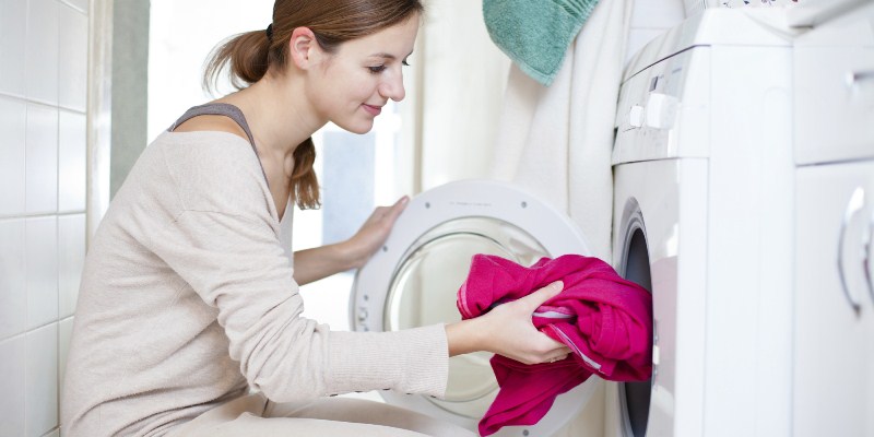 A lady washing clothes 