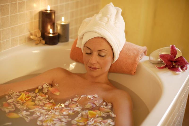 Lady relaxing in the bath