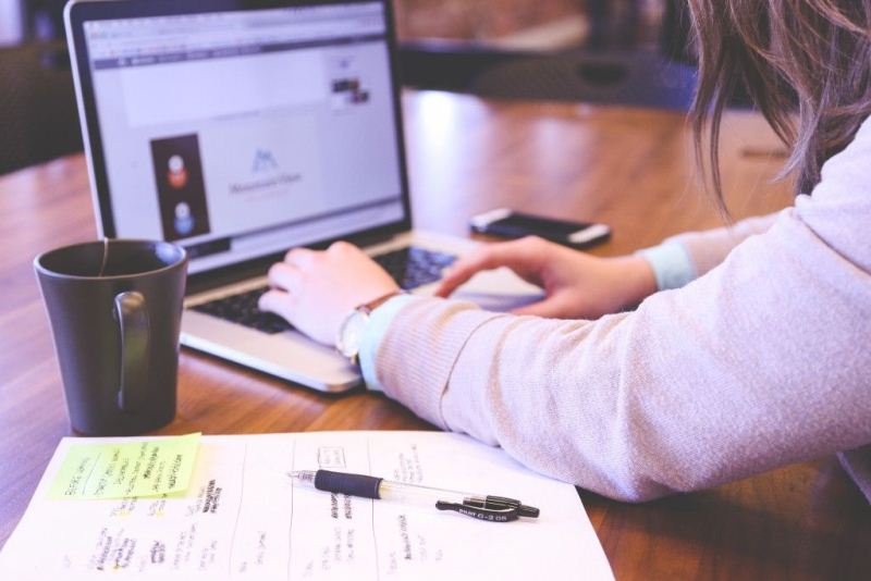 A lady working on the laptop