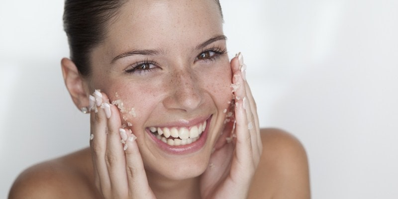 Lady using salt scrub