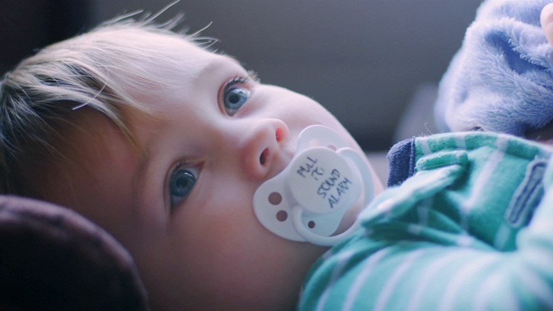 A liitle baby with pacifier