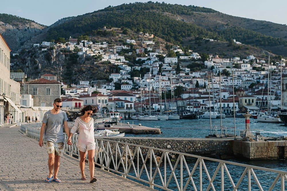 Couple walking at the harbor. 