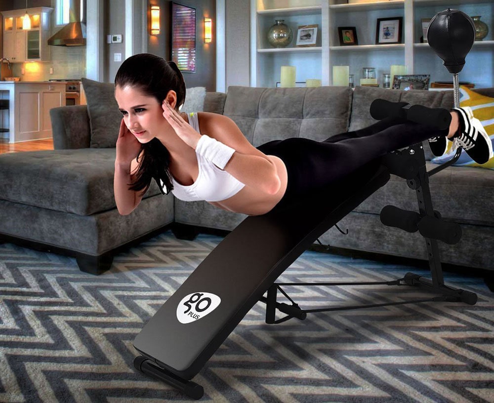 Woman working out on exercise bench.