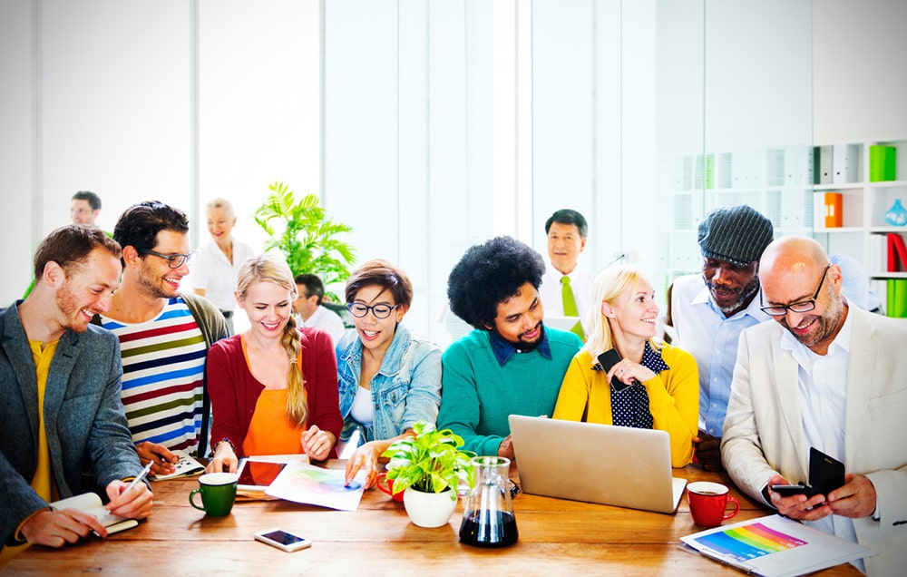 Group of people sitting at the table.