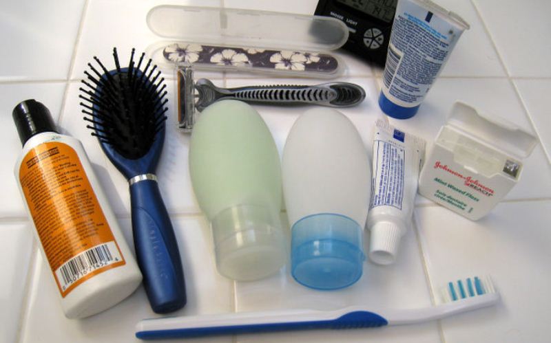 Toiletries laying out on the tile