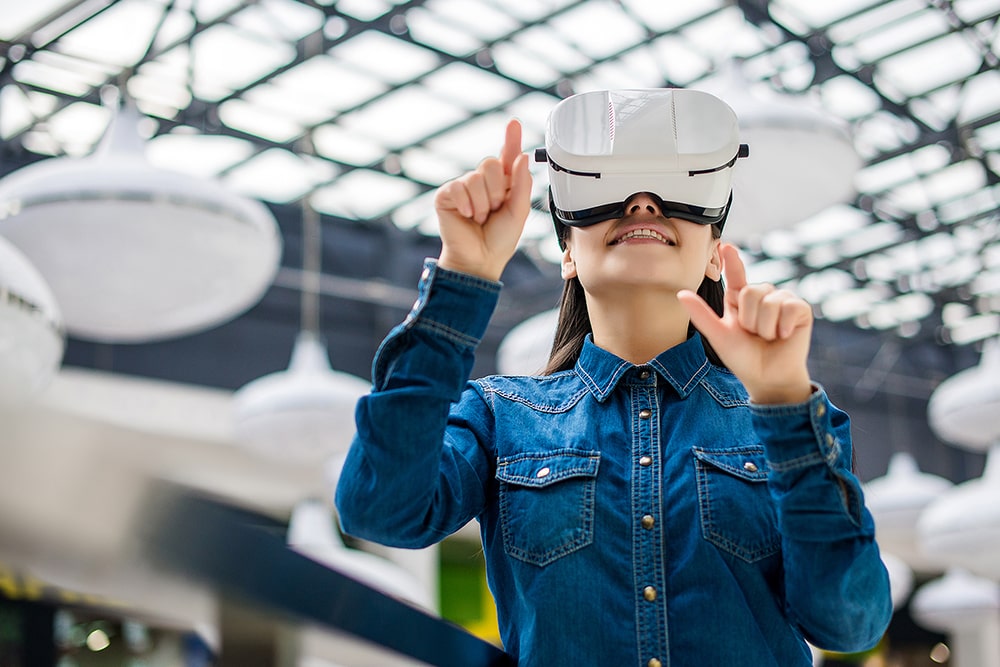 Woman using virtual reality headset.